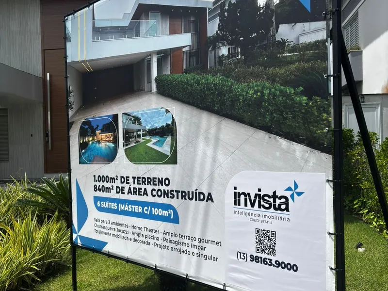 Painel de stand de vendas com estrutura em metalon e lona impressa para a imobiliária Invista — Cromatica Comunicação Visual, Santos/SP
